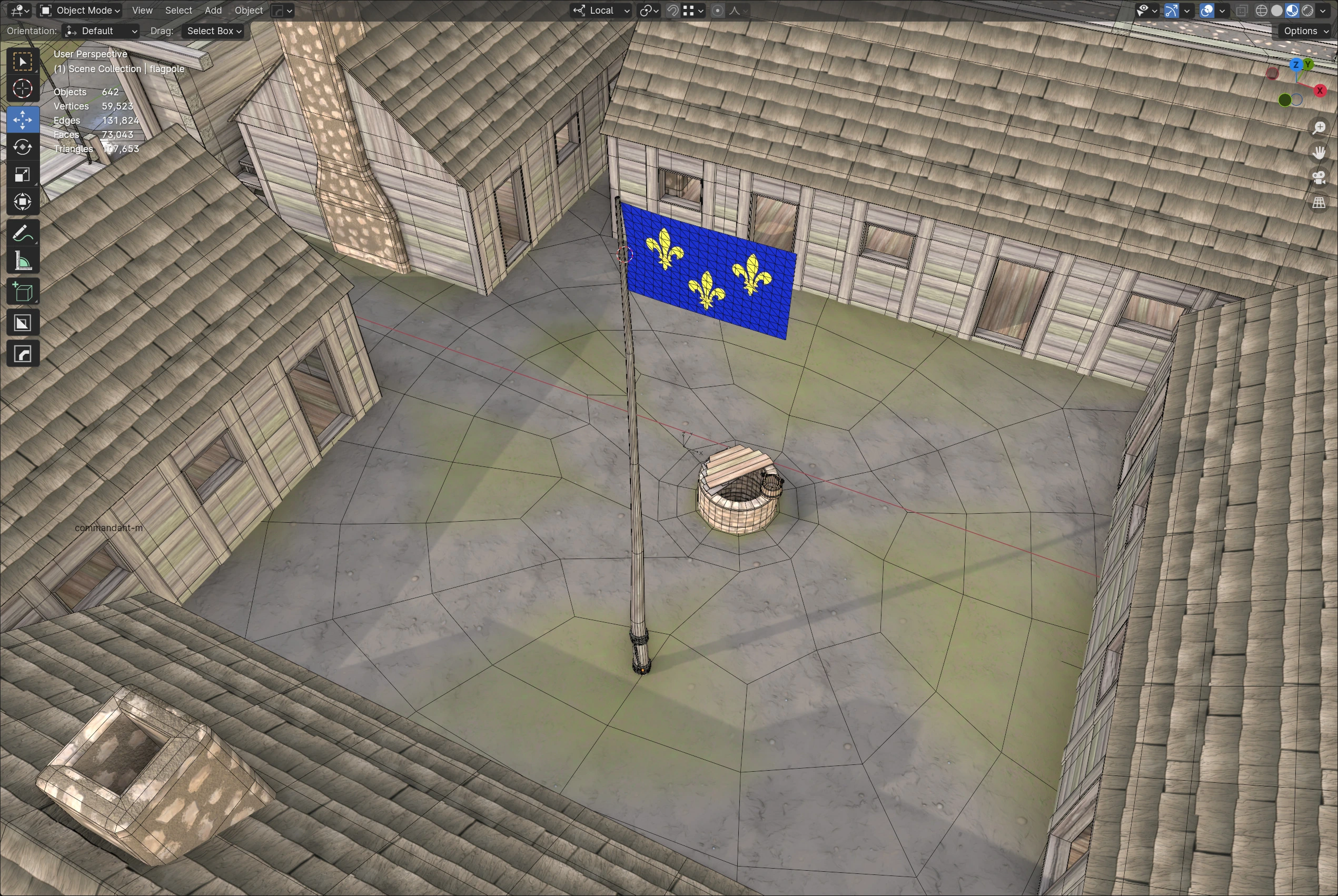 A view of the Fort Duquesne courtyard from above inside the Blender application, showing the low-polygon wireframe of the buildings and well.