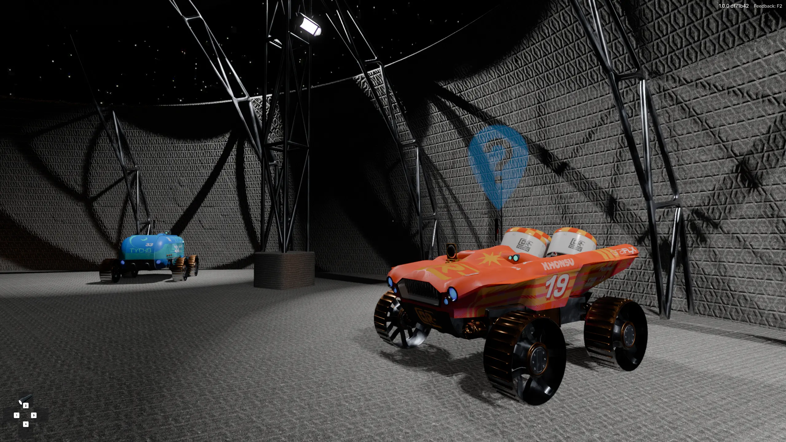 The interior of a lunar dome showing two colorful, futuristic racing rovers parked on a patterned floor under spotlights.